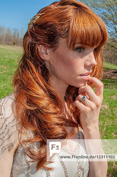 Portrait of red headed bride