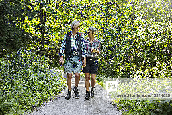 Couple walking in forest