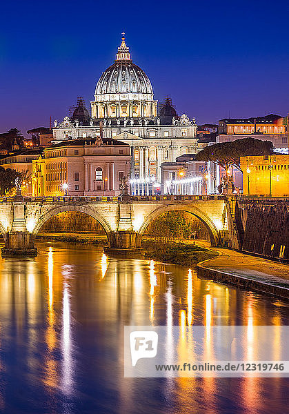 St. Peter's Basilica in Vatican City lit up after dark and Tiber River  Rome  Lazio  Italy  Europe