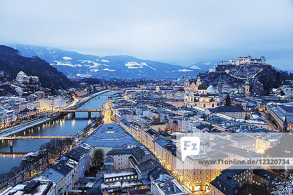 View over the old town, UNESCO World Heritage Site, and Hohensalzburg Castle at dusk, Salzburg, Austria, Europe