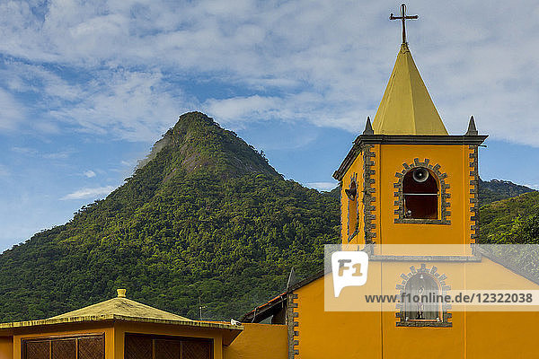The Church of San Sebastian and the Parrot Peak (Pico do Papagaio)  Vila do Abraao  Ilha Grande  Rio de Janeiro  Brazil  South America