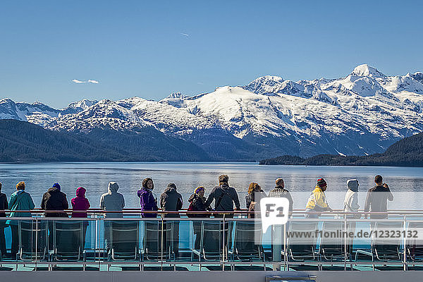 Tourists on cruise ship in College Fjord in Glacier Bay National Park and Preserve; Alaska  United States of America