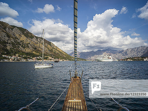 Sailboats and a cruise ship outside Kotor in the Bay of Kotor; Kotor  Kotor Municipality  Montenegro