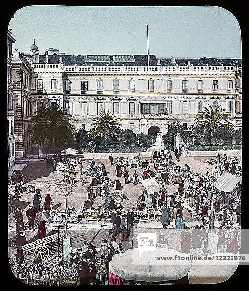 Magic Lantern slide circa 1900. Victorian or Edwardian era. The origional monchrome ( black and white ) photograph hand coloured.The photograph is the work of G.W. Wilson photographer and slide manufacturer 1823-1893.George Washington Wilson (7 February 1823 – 9 March 1893) was a pioneering Scottish photographer. The French Riviera and Monte Carlo (lecture ) .Slide 26 Market-Place Nice