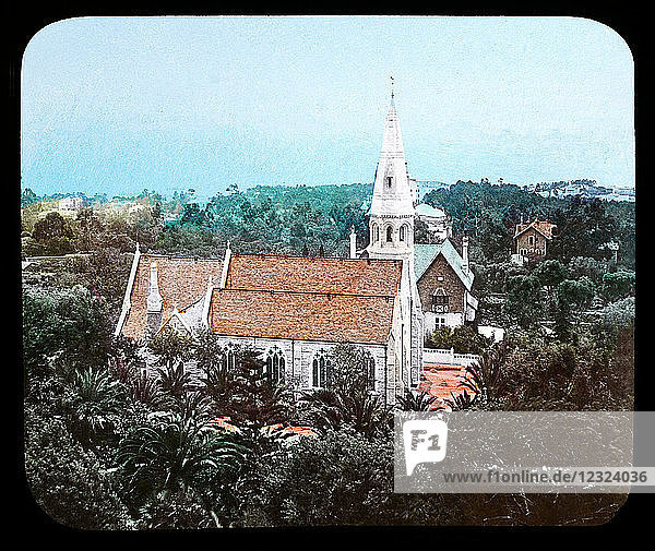 Magic Lantern slide circa 1900. Victorian or Edwardian era. The origional monchrome ( black and white ) photograph hand coloured.The photograph is the work of G.W. Wilson photographer and slide manufacturer 1823-1893.George Washington Wilson (7 February 1823 – 9 March 1893) was a pioneering Scottish photographer. The French Riviera and Monte Carlo (lecture ) . Slide 10 St Georges church  Cannes. A beautiful 19th-century building  erected in memory of the Duke of Albany  son of Queen Victoria  who died in Cannes. St George's Church belongs to the British Royal Family. You can admire a recumbent statue of the duke in marble  as well as beautiful stained glass windows. Times for Mass at St George’s Church Every Saturday at 5.30 pm  and on Heritage Day.