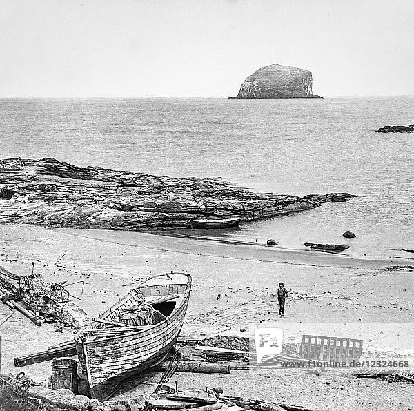 Magic lantern slide circa 1900.Victorian/Edwardian.Social History.Canty Bay is a coastal hamlet off the A198  in East Lothian  Scotland  situated opposite the Bass Rock and Tantallon Castle. Settlements nearby include Auldhame  Scoughall  Seacliff  and the Peffer Sands.This former fishing hamlet has been immortalised by William McGonagall in his poem Beautiful North Berwick and its surroundings. The Canty Bay Inn offered hospitality to the many tourists who came to see the Rock. The tenant of the Rock was usually also the innkeeper.