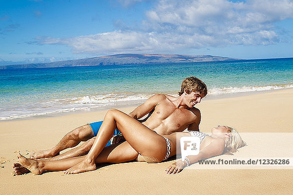 Attractive Young Couple On Tropical Beach