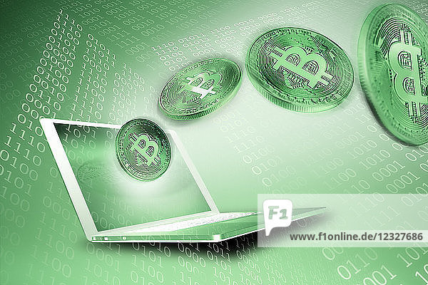 Green Bitcoins and laptop