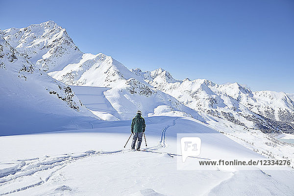 Austria  Tyrol  Kuehtai  skier in winter landscape