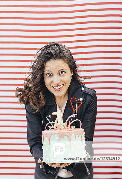 Portrait of woman with Birthday cake