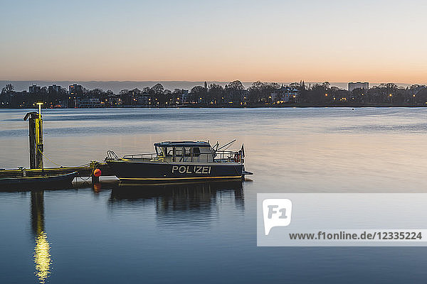 Germany Hamburg Outer Alster Lake mooring area police boat in the morning