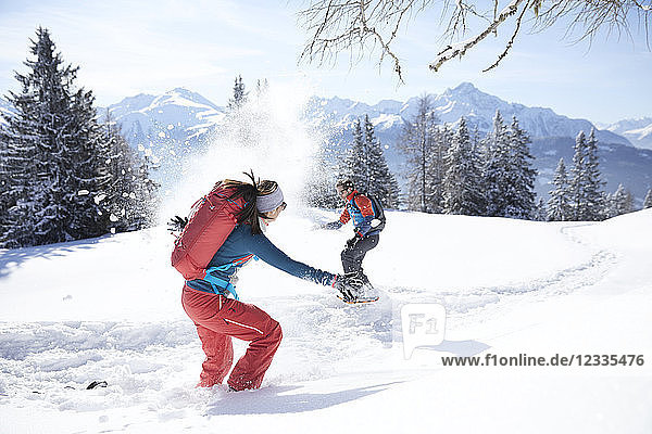 Austria  Tyrol  couple having fun in the snow