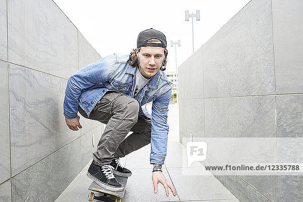 Young man skateboarding in the city