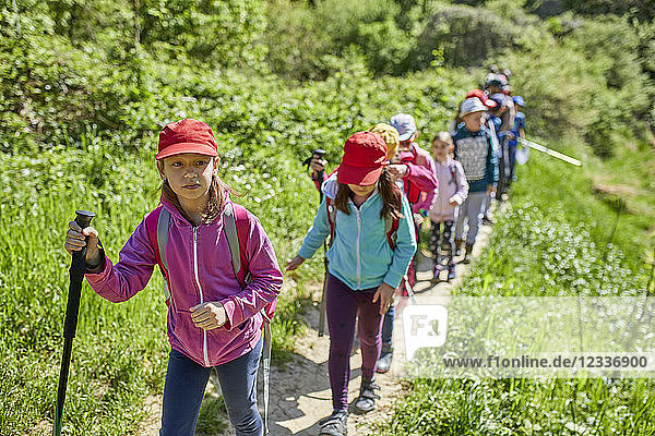 Kids on a field trip on trail