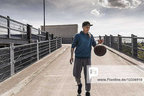 Man dribbling with basket ball