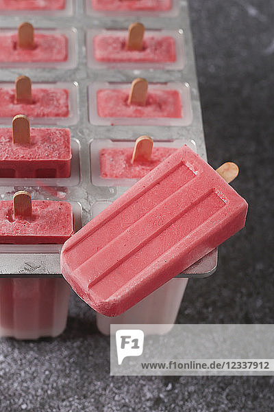 Homemade strawberry ice lollies