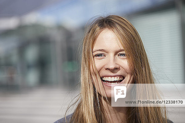 Portrait of laughing young woman