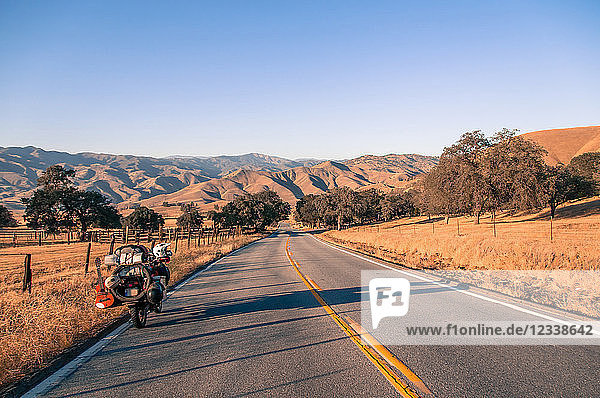 Motorcycle on open road  Yosemite National Park  United States