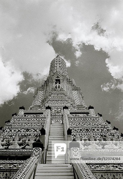 Buddhist Temple of Dawn Wat Arun Temple in Bangkok Yai on the Thonburi side of the Chao Pharaya River in Bangkok in Thailand in Southeast Asia Far East.