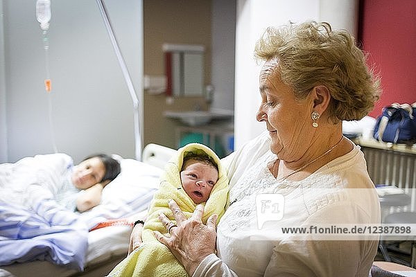 Grandmother with newborn in hospital  family  Bavaria  Germany  Europe