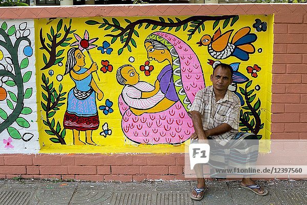 Student paints a mural to celebrate upcoming Bengali New Year 1423 in Dhaka. Preparations are underway for the festivities Pahela Boishakh. People make crafts for the celebrations. Pahela Boishakh (the first day of the Bangla month) can be followed back to its origins during the Mughal period when Emperor Akbar introduced the Bangla calendar to streamline tax collection while in the course of time it became part of Bengali culture and tradition.