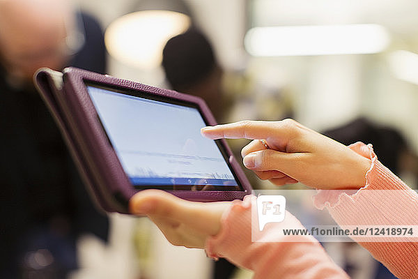 Close up businesswoman using digital tablet