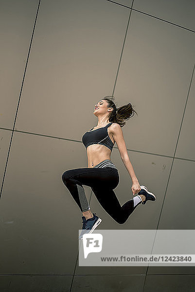 Sportive woman jumping