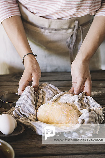 Raw pasta dough in kitchen towel