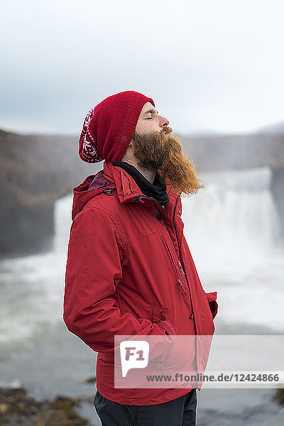 Iceland  North of Iceland  young man with closed eyes