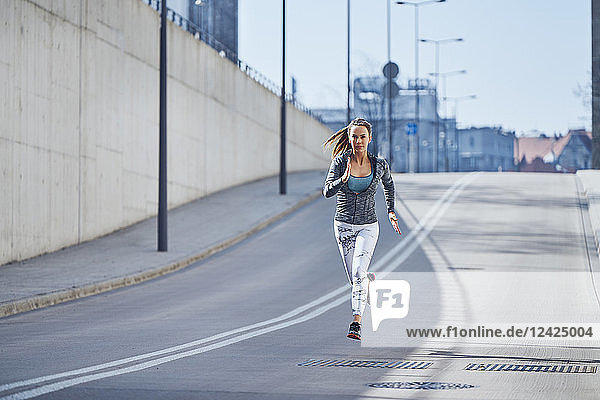 Female runner during urban workout