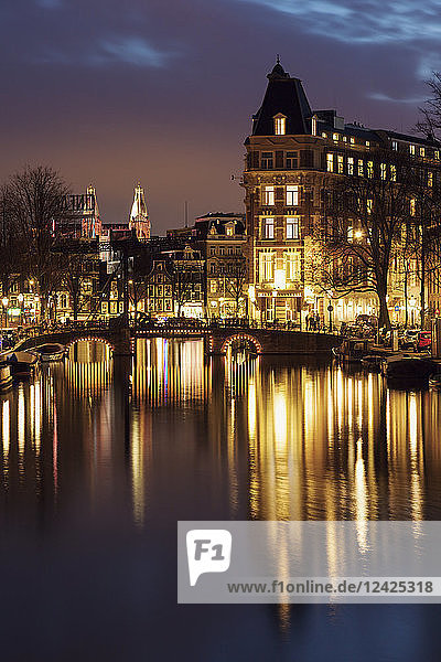 Netherlands  Amsterdam  Bascule bridge over canal at night