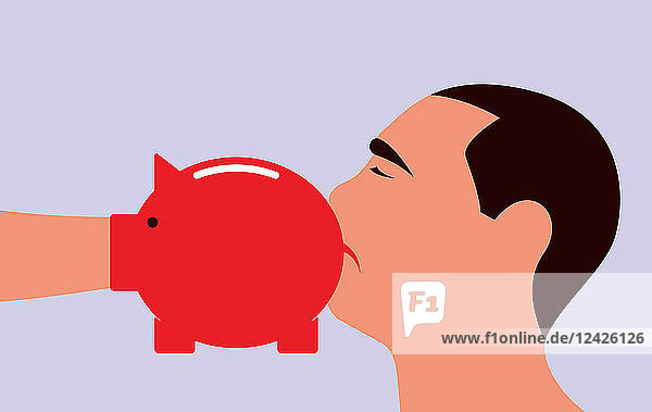 Man being punched by piggy bank boxing glove
