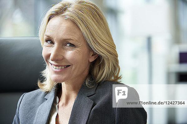 Close-up of businesswoman smiling