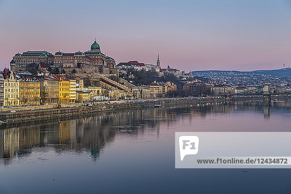 View of Budapest Castle reflecting in the Danube River during early morning  UNESCO World Heritage Site  Budapest  Hungary  Europe