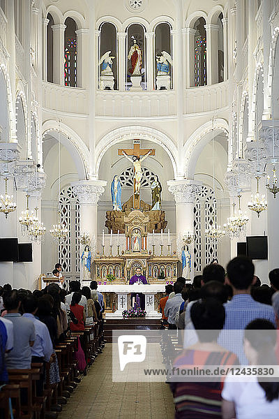 Church of the Sacred Heart of Jesus (Nha Tho Tan Dinh)  Sunday mass celebration  Ho Chi Minh City  Vietnam  Indochina  Southeast Asia  Asia