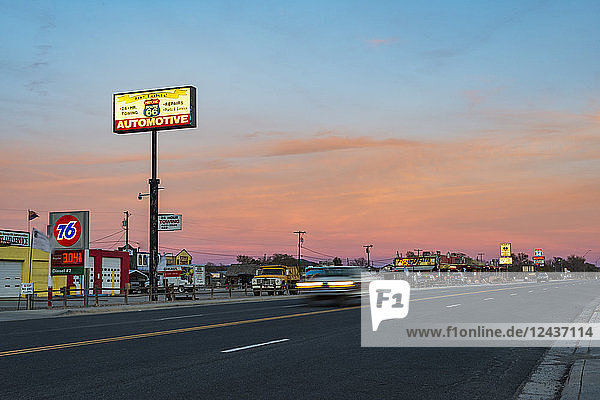 Historic Route 66 town glowing at sunset Seligman Arizona United States of America North America