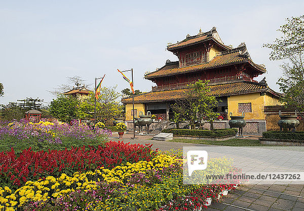 Multicoloured flowers to celebrate the Tet holiday at the Hien Lam Pavilion in the Imperial City the Citadel UNESCO World Heritage Site Hue Vietnam Indochina Southeast Asia Asia