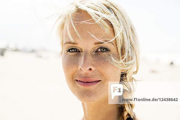 Portrait of blond woman outdoors