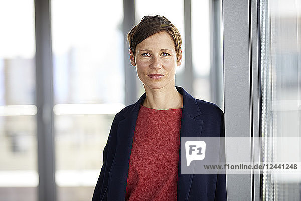 Portrait of smiling woman in office