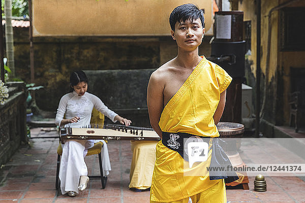 Vietnam  Hanoi  young man wearing Kung Fu clothes