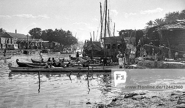 Glass Negative WW1 photographs in Iraq ( esopotamia )and surrounding area’s. Ashar Creek Iraq scene with boats and cargo