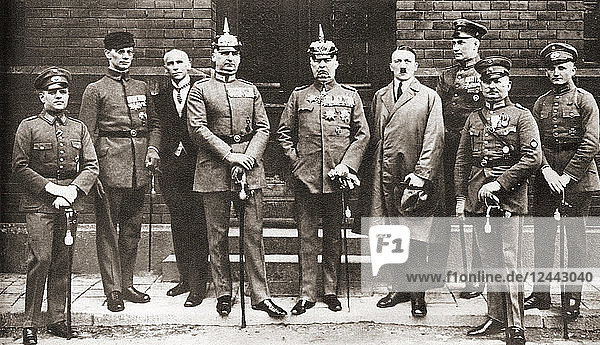 The defendants in the Munich Putsch trial aka Beer Hall Putsch of 1924 a failed coup attempt by the Nazi Party led by Adolf Hitler to seize power in Munich Bavaria on 8–9 November 1923. From left to right: Pernet Weber Frick Kriebel Ludendorff Hitler Bruckner Röhm and Wagner. Adolf Hitler 1889 – 1945. German politician demagogue Pan German revolutionary and the leader of the Nazi Party. From These Tremendous Years published 1938.