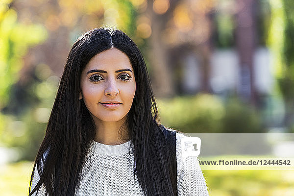 Portrait of a young female university student of Lebanese ethnicity on campus  Edmonton  Alberta  Canada