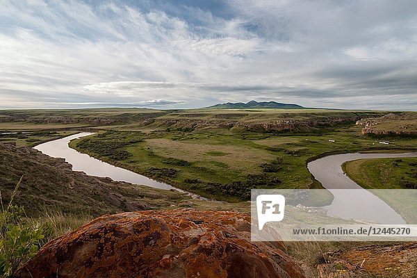 Badlands in Writing on stone Provincial Park shaped by Milk River Alberta Canada.