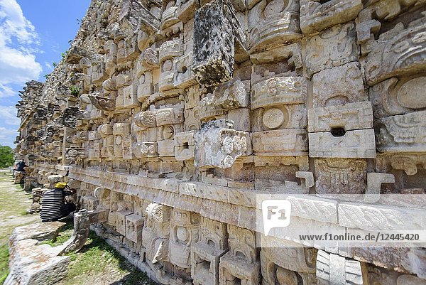 Photographer in the ruins at Kabah Yucatan Peninsula Mexico.