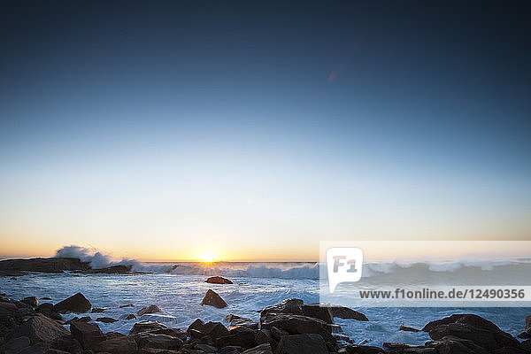 Wave Action Along The Rocky Coast Of Rhode Island During Sunrise