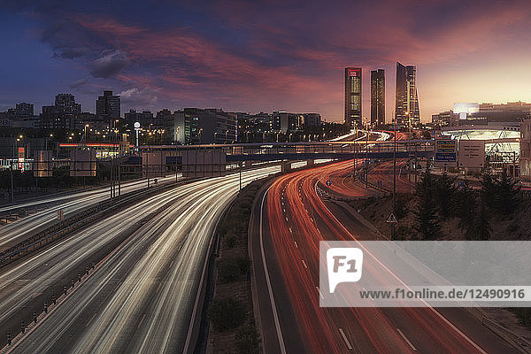 High Angle View Of Trail Light Running On Highway In Madrid City