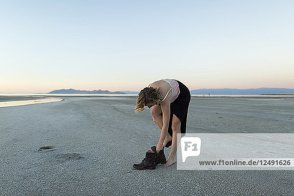 A young woman gets ready to swim in the Great Salt Lake  Utah.