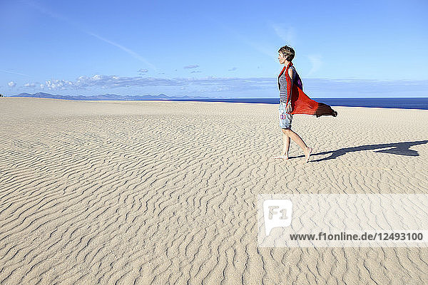Woman Walking In Dunes Of Corralejo  Canary Islands  Spain