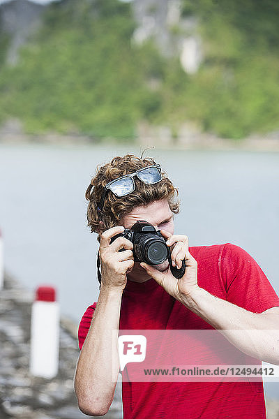 Close-up Of A Man Taking Picture From The Camera